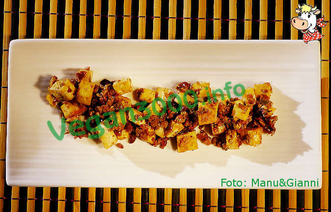 Foto numero 2 della ricetta Marinated tofu with ginger, olives and capers