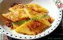 Squares of polenta fried with onions